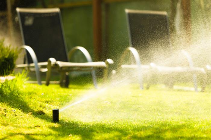 is water damage from lawn irrigation pipe excluded as ‘surface water damage’? 